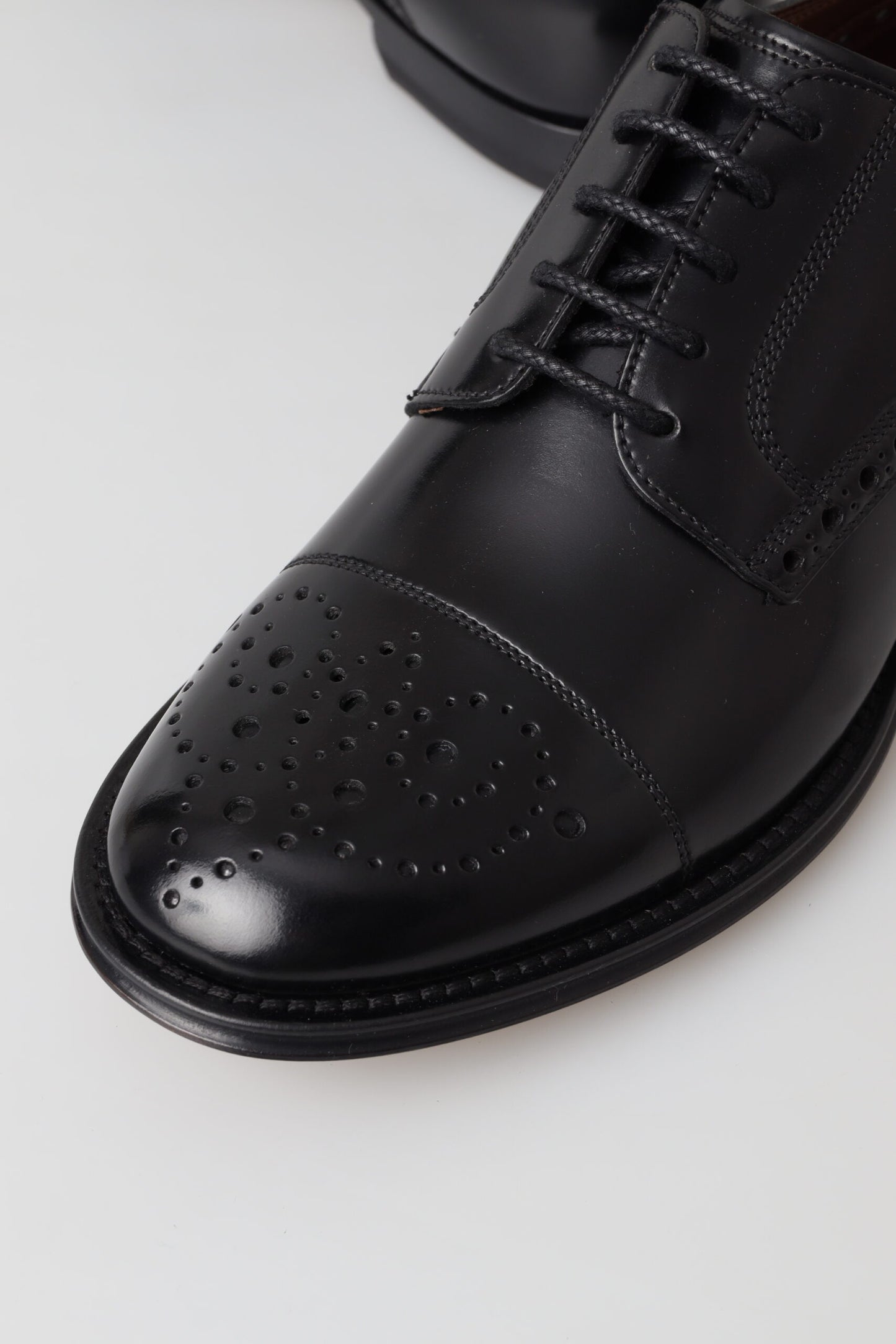 Dolce & Gabbana Elegant Black Leather Oxford Wingtip Shoes